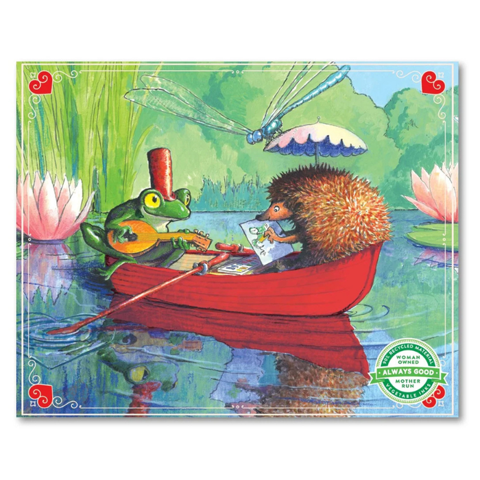 The Boat Ride | 36 Piece Jigsaw Puzzle by eeBoo features a frog with a stringed instrument and a hedgehog with a map in a red rowboat on a pond, surrounded by water lilies and a dragonfly.