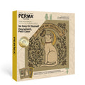 The PERMA Puzzle "Go Easy On Yourself" is a 321-piece jigsaw featuring a cat with a butterfly on its nose. The beige box includes foil embellishments, gold accents, and puzzle details for an elegant touch.