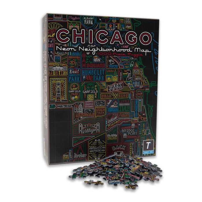 The "Neon Neighborhood Map | 1,000 Piece Jigsaw Puzzle" by Transit Tees showcases a neon-style Chicago map, with the box standing upright and puzzle pieces spread out in front.