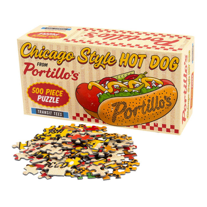 The Portillo's Hot Dog | 500 Piece Jigsaw Puzzle by Transit Tees features a Chicago-style hot dog illustration on the box, with loose puzzle pieces displayed in front.
